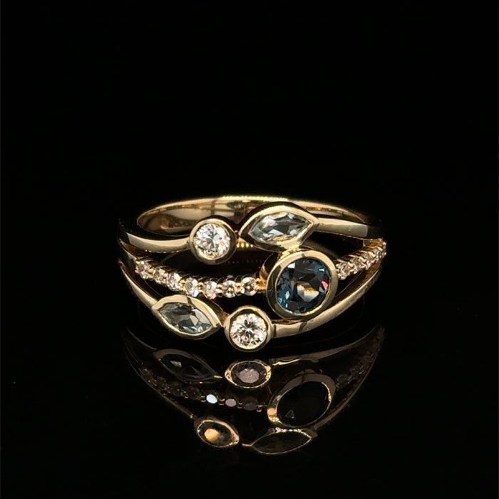 Blue Topaz and Diamond Ring in Gold