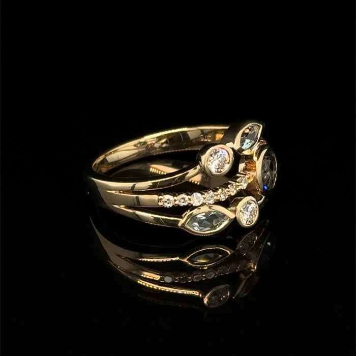 Blue Topaz and Diamond Ring in Gold