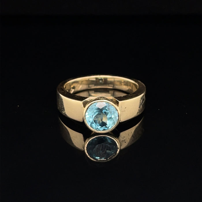 Topaz ring set in Yellow Gold